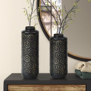 Black and gold metal vase